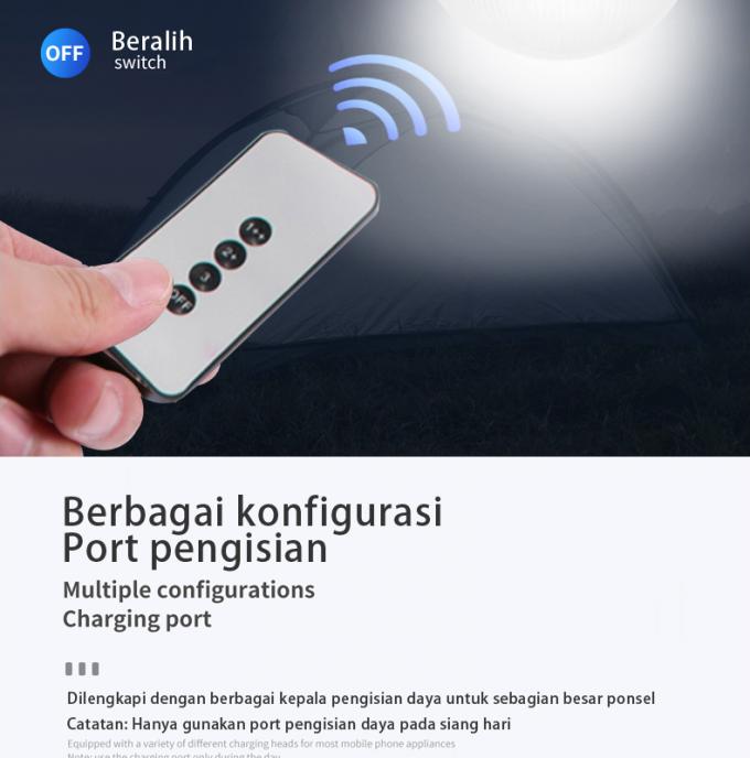 Uma lâmpada de carregamento solar portátil de Tuo Four 25W que acampa para fora telefone celular que carrega a lâmpada solar